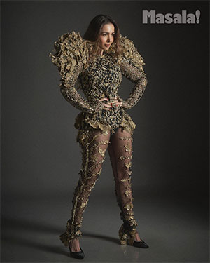 Malaika Arora looks elegant and classy in a golden embroidered outfit with puff sleeves